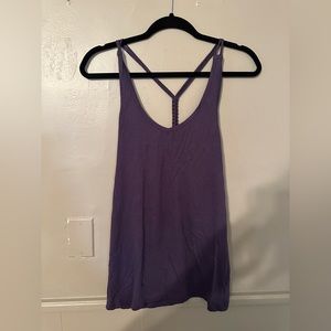 Gap purple racer back tank top. Never worn out. Size Medium.